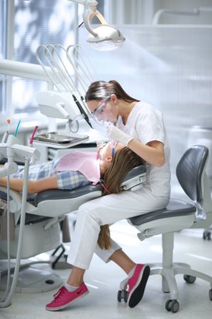 young-dentist-at-work_t20_e3k87B
